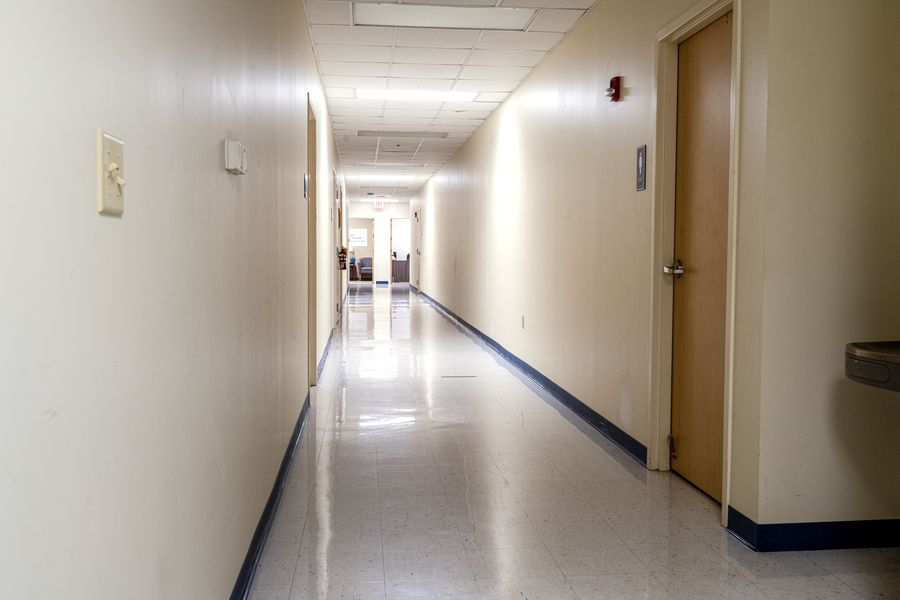 A hallway of move-in-ready office and lab suites
