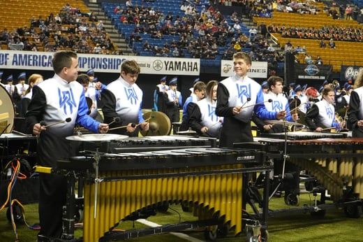 Three percussion students from West Ridge play the xylophone. 