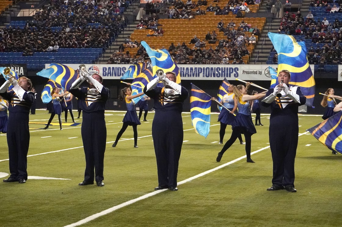 ETSU Marching band members play trumpet. 